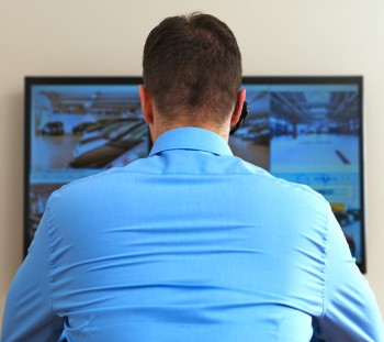 monitoring video in security room